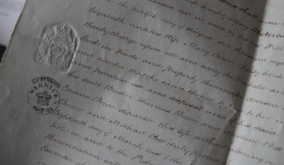 Close-up of aged legal documents with official seals and handwritten text, symbolizing travel permits and wildlife regulations.