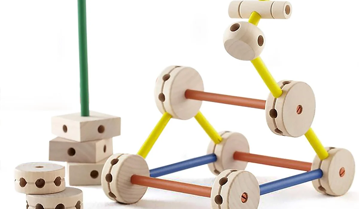 Colorful wooden modular toy set with interlocking rods and wheels.